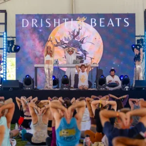 Online yoga class with music — Lori Lowell leading a vinyasa flow filmed in Bali with Drishti Beats.